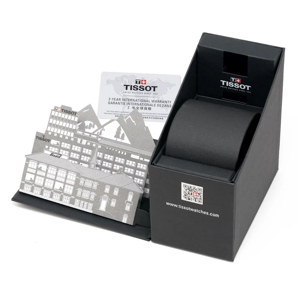 กล่องนาฬิกา Tissot สีดำ เปิดออก แสดงใบรับประกันและรายละเอียดแบรนด์
